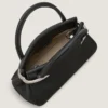 Borsa Pinch media in pelle martellata