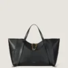 Borsa Snatch grande in pelle martellata Borsa Snatch grande in pelle martellata