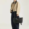 Borsa Snatch grande in pelle martellata Borsa Snatch grande in pelle martellata