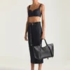 Borsa Snatch grande in pelle martellata Borsa Snatch grande in pelle martellata