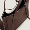 Borsa Snatch grande in pelle martellata Borsa Snatch grande in pelle martellata