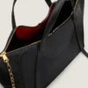 Borsa Snatch grande in pelle martellata Borsa Snatch grande in pelle martellata