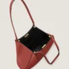 Borsa tote piccola a faccette in pelle martellata Borsa tote piccola a faccette in pelle martellata