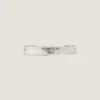 Bracciale a cuffia Givenchy Tape in metallo e smalto Bracciale a cuffia Givenchy Tape in metallo e smalto