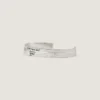 Bracciale a cuffia Givenchy Tape in metallo e smalto Bracciale a cuffia Givenchy Tape in metallo e smalto