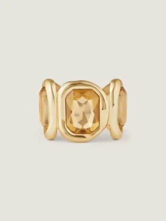 Bracciale rigido scultoreo in metallo e cristalli
