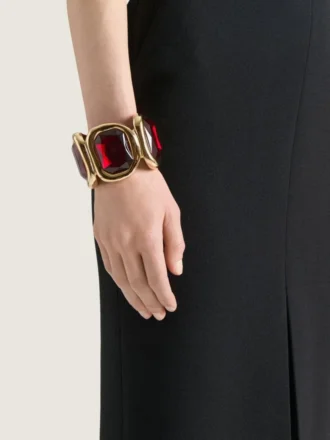 Bracciale rigido scultoreo in metallo e cristalli