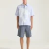 Camicia a righe in cotone con stampa surrealista Camicia a righe in cotone con stampa surrealista