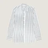 Camicia a righe in popeline con stampa surrealista Camicia a righe in popeline con stampa surrealista