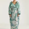 Cappotto lungo con spacchi in jacquard a rose Cappotto lungo con spacchi in jacquard a rose