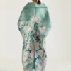 Cappotto lungo con spacchi in jacquard a rose Cappotto lungo con spacchi in jacquard a rose