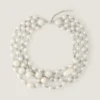 Collana in metallo, perle e cristalli Collana in metallo, perle e cristalli