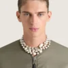 Collana in metallo, perle e cristalli Collana in metallo, perle e cristalli