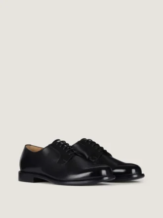Derby Label in pelle