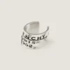 Earcuff Givenchy Tape in metallo e smalto Earcuff Givenchy Tape in metallo e smalto