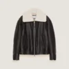 Giacca Aviator in pelle e shearling con cuciture couture Giacca Aviator in pelle e shearling con cuciture couture
