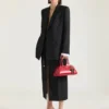Giacca doppiopetto con spacchi in lana e mohair Giacca doppiopetto con spacchi in lana e mohair