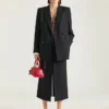 Giacca doppiopetto con spacchi in lana e mohair Giacca doppiopetto con spacchi in lana e mohair