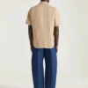 Jeans blu indaco con cuciture couture e stampa con timbro Givenchy