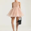 Mini abito babydoll con volant in nylon Mini abito babydoll con volant in nylon
