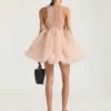 Mini abito babydoll con volant in nylon Mini abito babydoll con volant in nylon