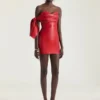 Mini abito bustier in pelle nappa con fiocco Mini abito bustier in pelle nappa con fiocco
