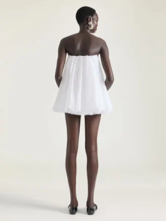 Mini abito bustier in pizzo con mantella