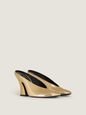 Mules con tacco scolpito in pelle effetto specchio