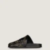 Mules piatte Label in pelle con borchie Mules piatte Label in pelle con borchie