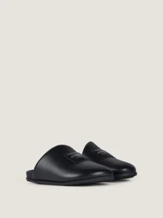 Mules piatte Label in pelle nappa