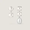 Orecchini asimmetrici con perle appuntite in metallo e perle Orecchini asimmetrici con perle appuntite in metallo e perle