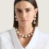 Orecchini asimmetrici con perle appuntite in metallo e perle Orecchini asimmetrici con perle appuntite in metallo e perle