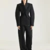 Pantaloni a bozzolo in lana con dettaglio rovesciato