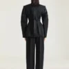 Pantaloni a bozzolo in lana con dettaglio rovesciato