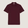 Polo in cotone con toppa Givenchy Polo in cotone con toppa Givenchy