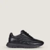 Sneakers in pelle lucida imbottita